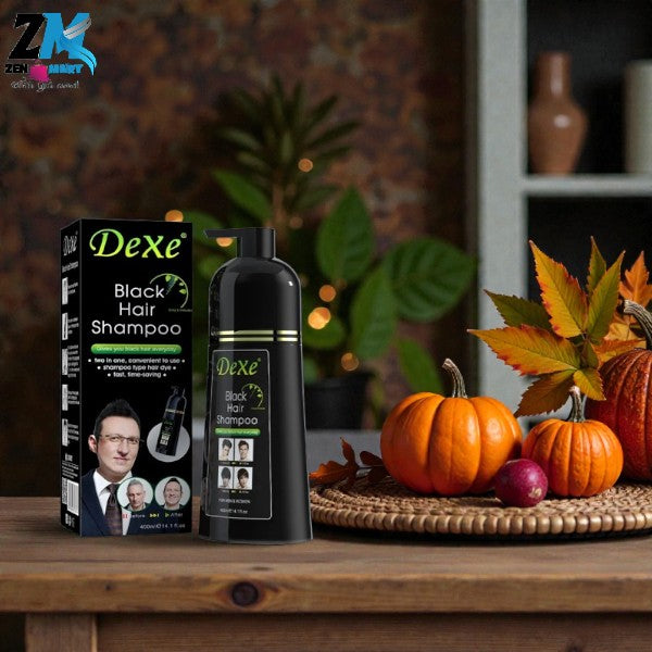 Dexe Black Hair Shampoo bottle and packaging on a wooden surface with pumpkins and leaves.